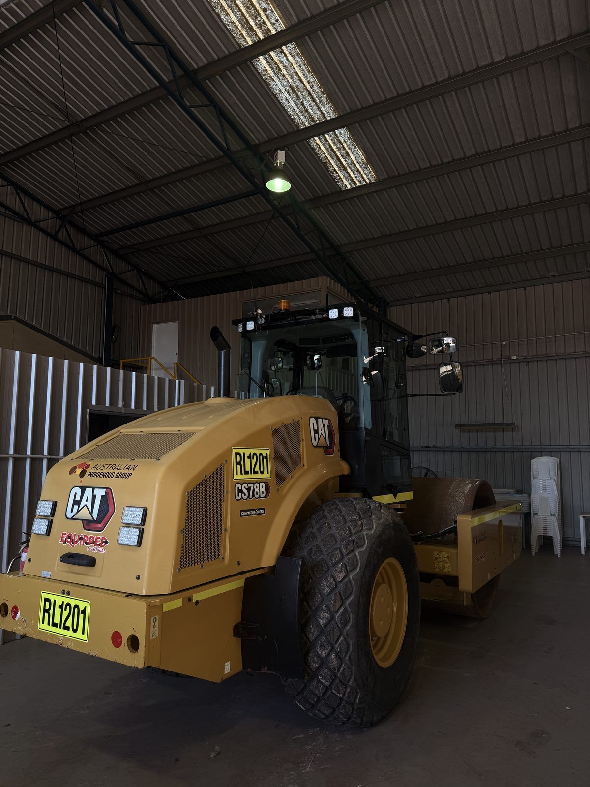 CAT roller fitted with LED work lights and a beacon