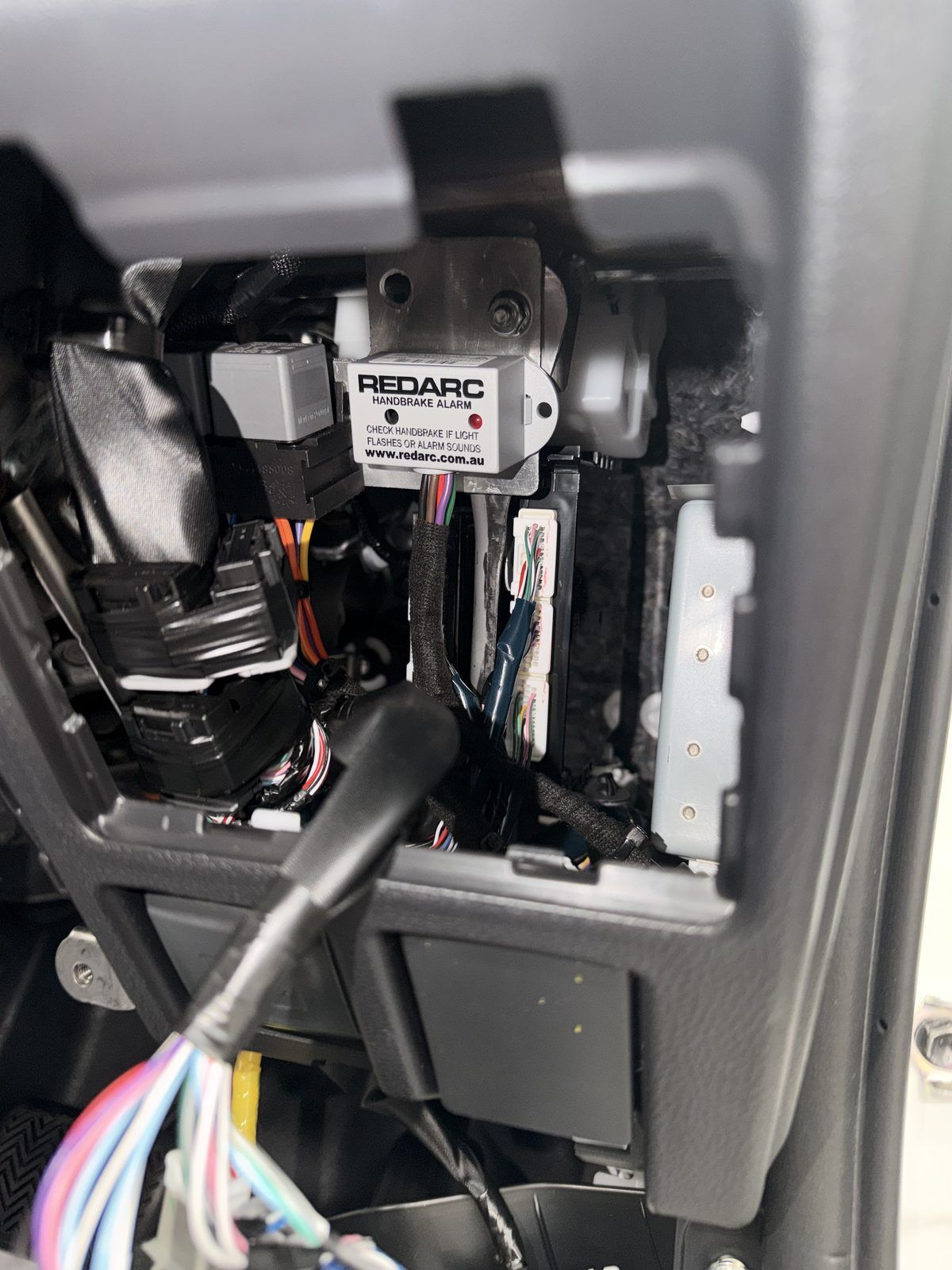 REDARC handbrake alarm wired in under the dash
