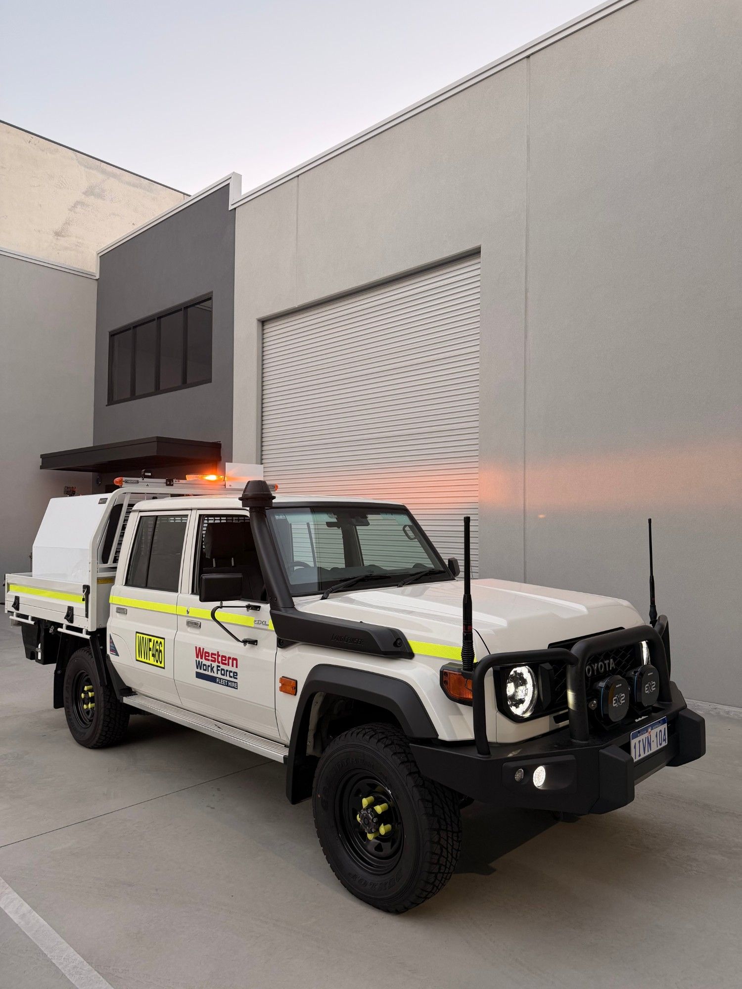 LandCruiser dual cab with mine spec fitout outside the workshop